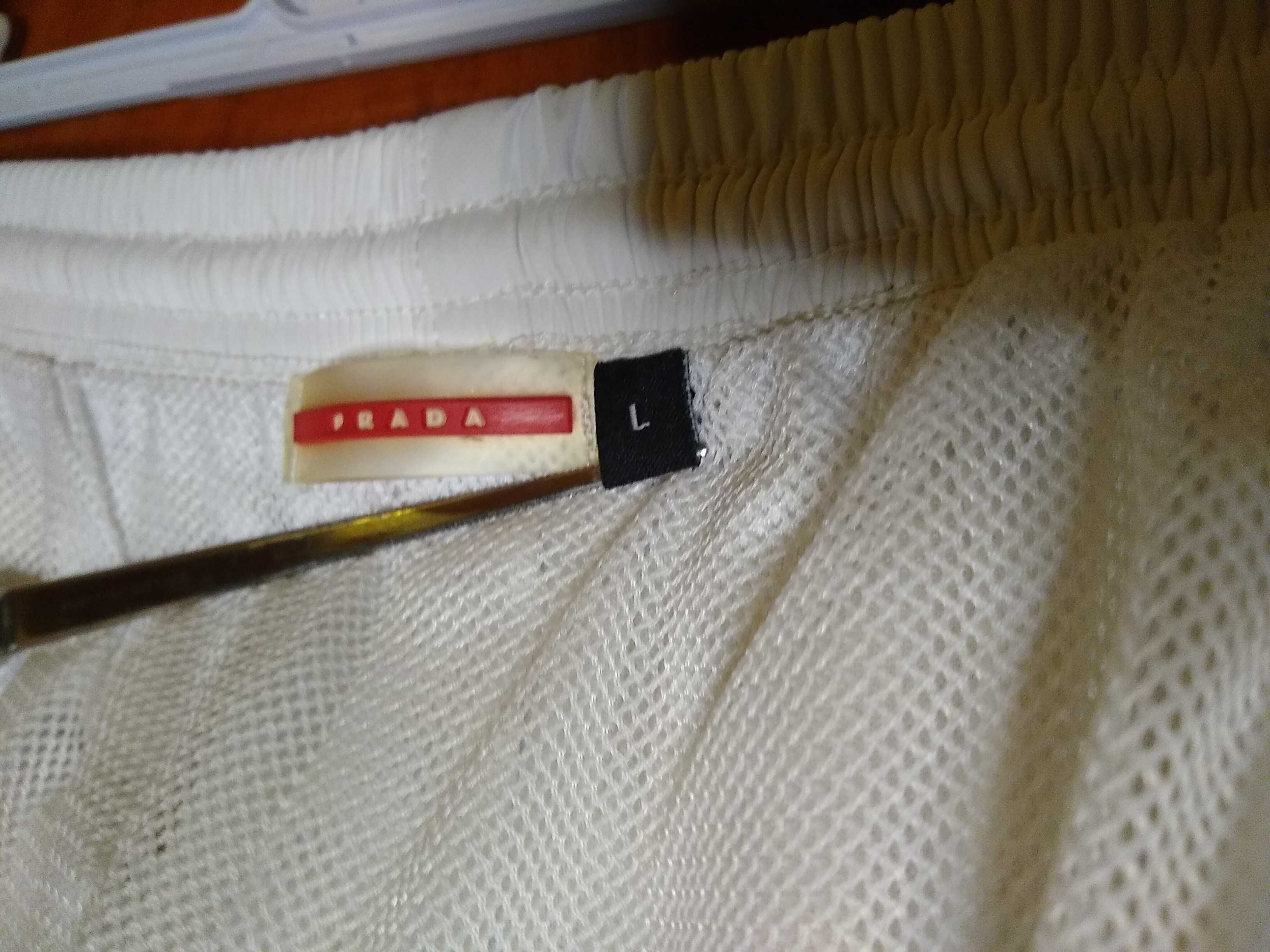 NOWE  Damskie białe spodnie sportowe z siateczkową podszewką,  L-XL