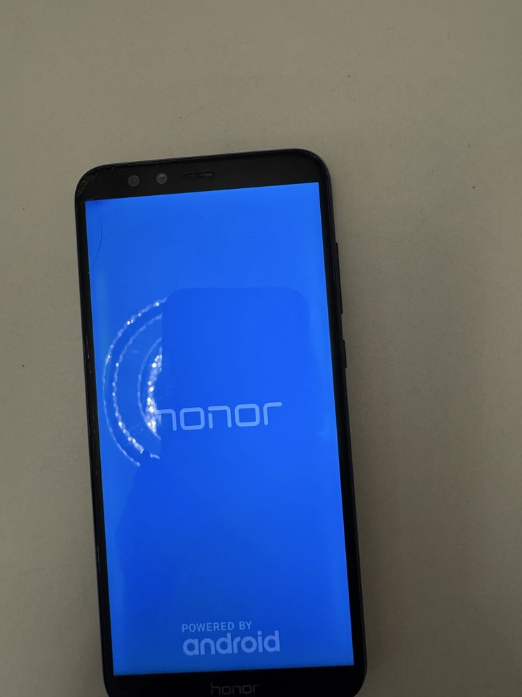Телефон honor глянець кришка чорного кольору