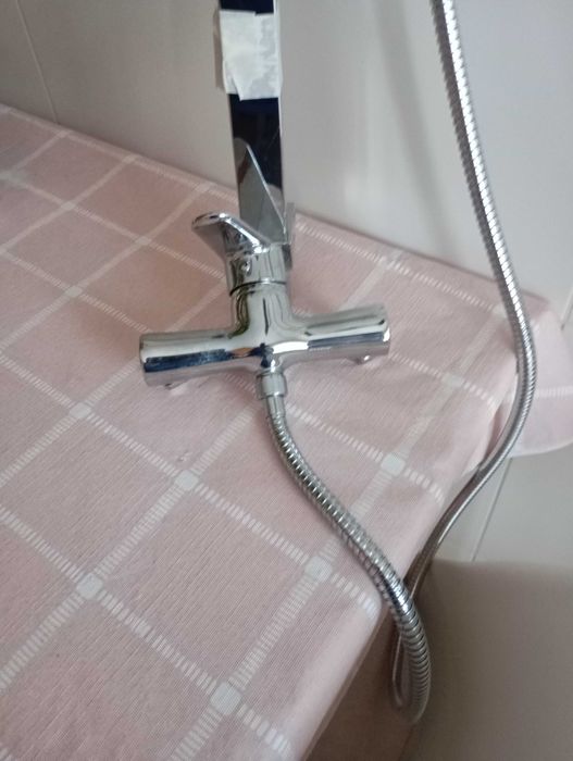 Coluna de duche como nova