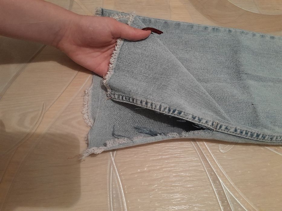 Джинси кльош від коліна світло-сині ,розмір 34 (XS]