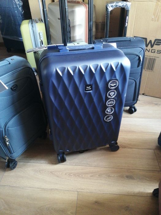 Валіза Чемодан Wings  на 4 колесах полікарбонова