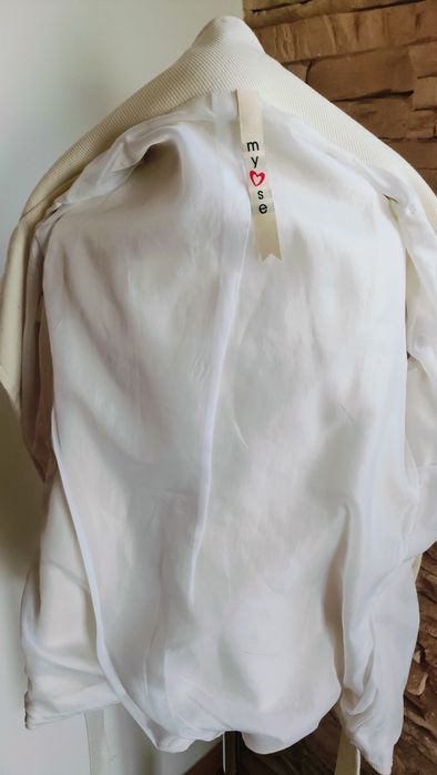 Casaco traçado cor pérola