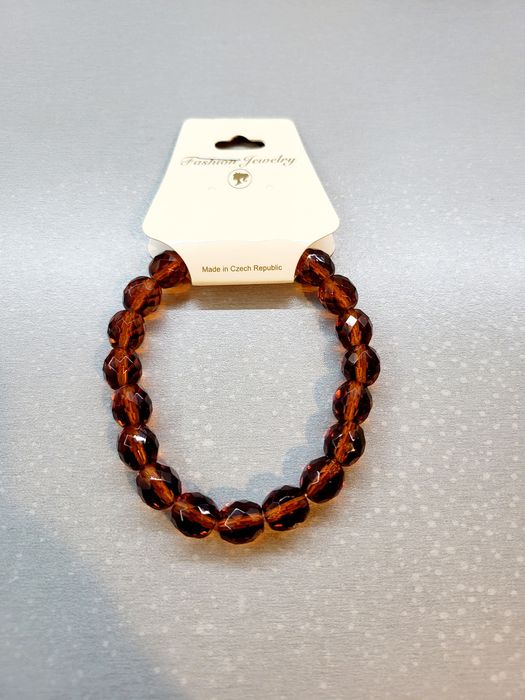 Bransoletka na gumce szlifowane szkło jasny brąz blask prezent