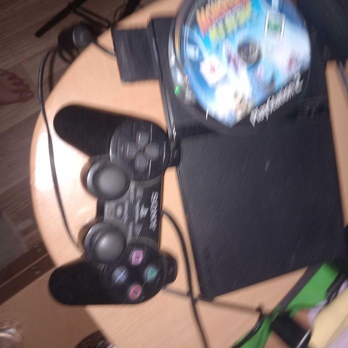 Vendo PS2 com varios jogos a trabalhar