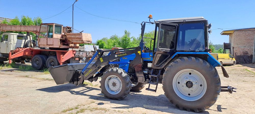 Быстросйомный фронтальный погрузчик кун Юмз