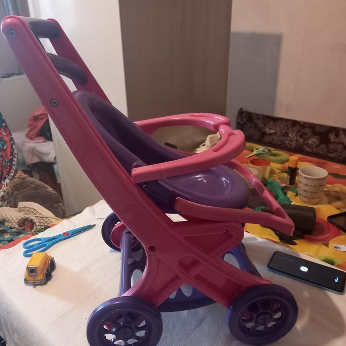 Дитяча качеля та Коляска візочок для ляльки