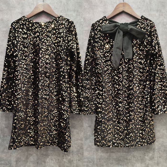 Nowa viralowa sukienka z cekinami i kokardą 134/140