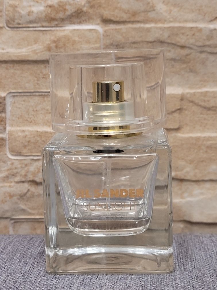 Flakon/ butelka po perfumach Jil Sander (pozostałość 0,5 cm)