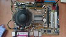 Комплект Asus P5N-MX + Xeon E5335 (4 ядра) + 2x512Mb DDR2 + Кулер