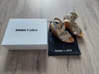 Sandálias douradas  Bimba Y Lola