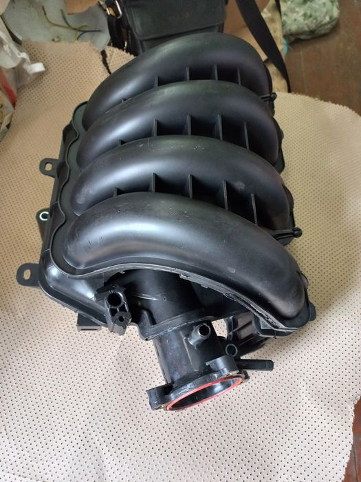 Коллектор новый  Мазда впускной объем 2,0 skyactiv
