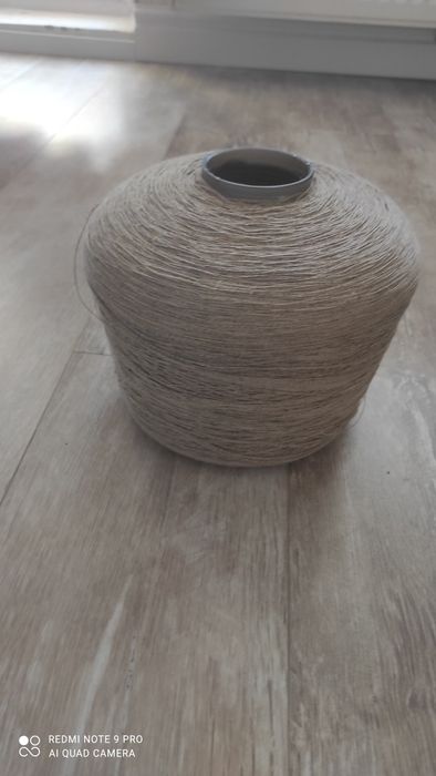 Нитки в бабинах льон