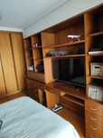 Estante quarto com arrumação