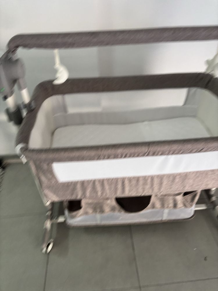 Cama de bebé eletrónica