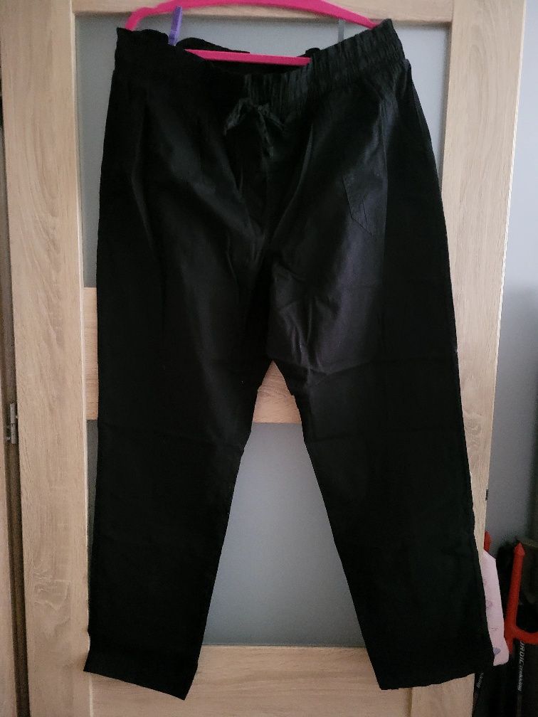 Nowe materiałowe czarne spodnie 50 damskie