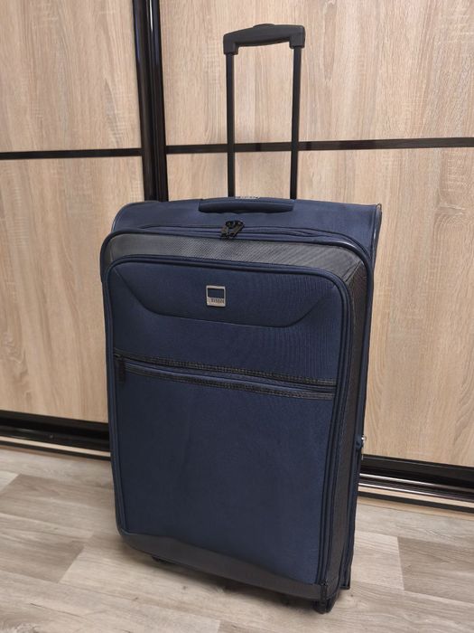 Чемодан бошьшого размера на колесах, валіза для подорожей тканина