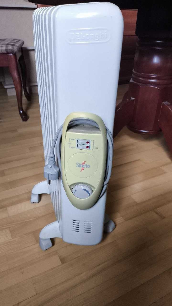Обогреватель масляный Delonghi TRSW 0715 1500 Вт на 7 секций
