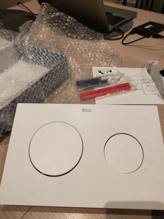 Nowy przycisk spłukujący Roca biały