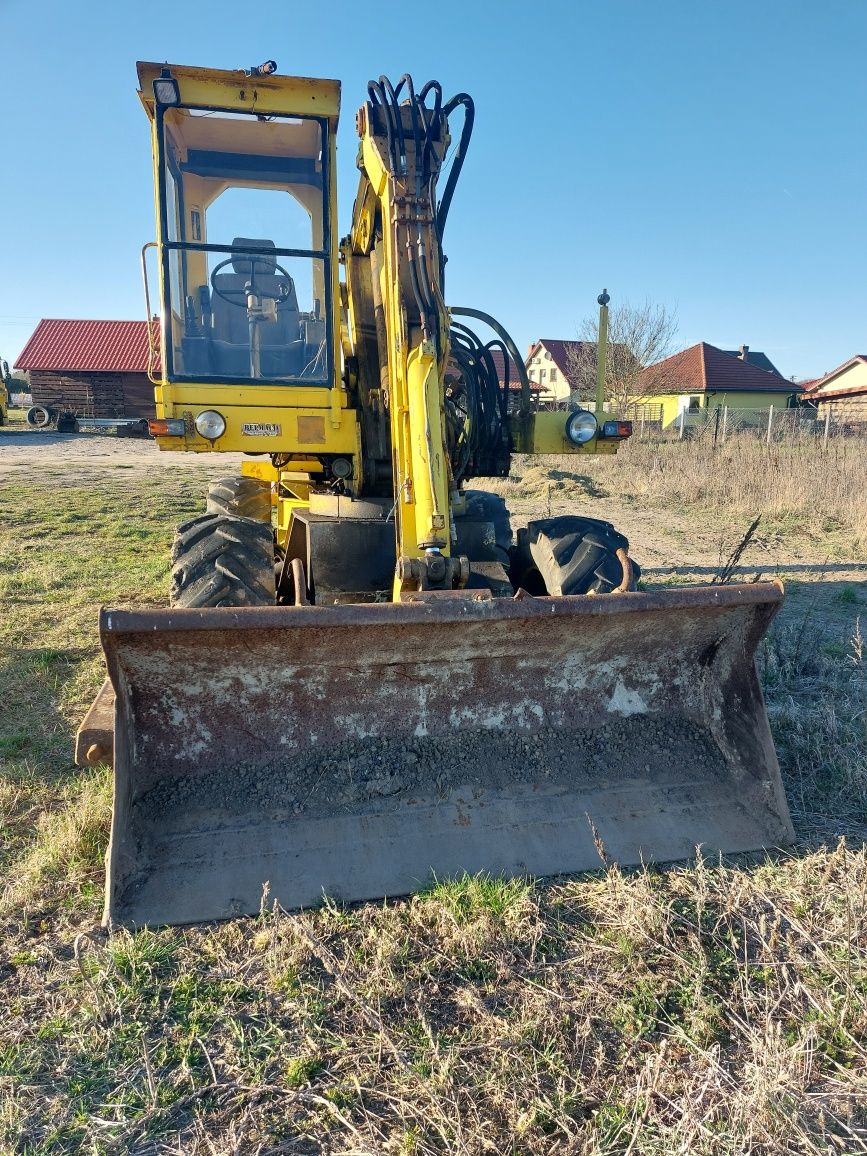 Koparko ładowarka Mecalac 11 CX zestaw łyżek