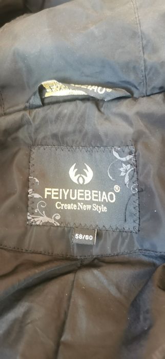 Женский пуховик бу