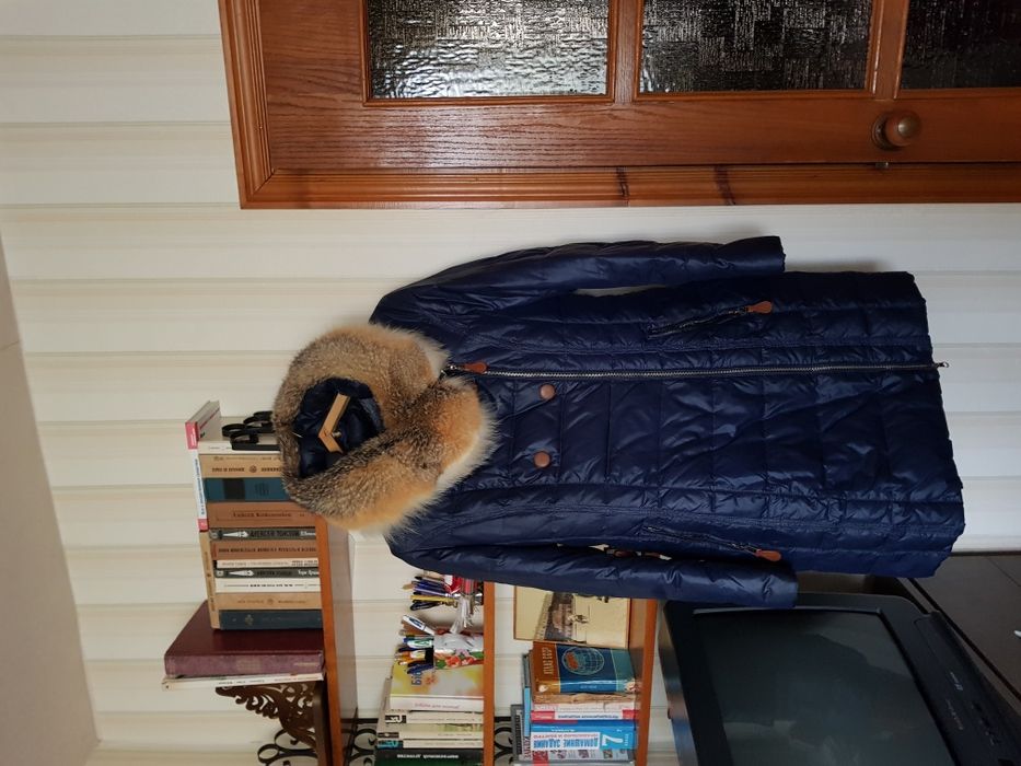 Продам пуховик в