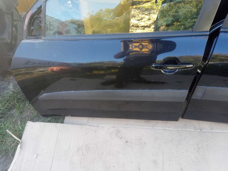 TOYOTA RAV4 III 06-12 drzwi lewe przód kolor czarny 202