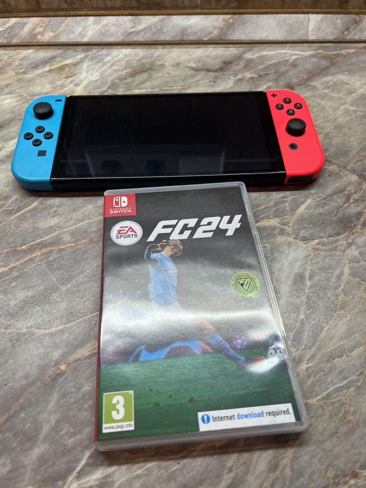 Продам Nintendo Switch Oled + катридж Fifa 2024