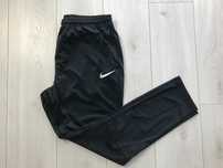 NIKE r.L oryginalne spodnie sportowe męskie
