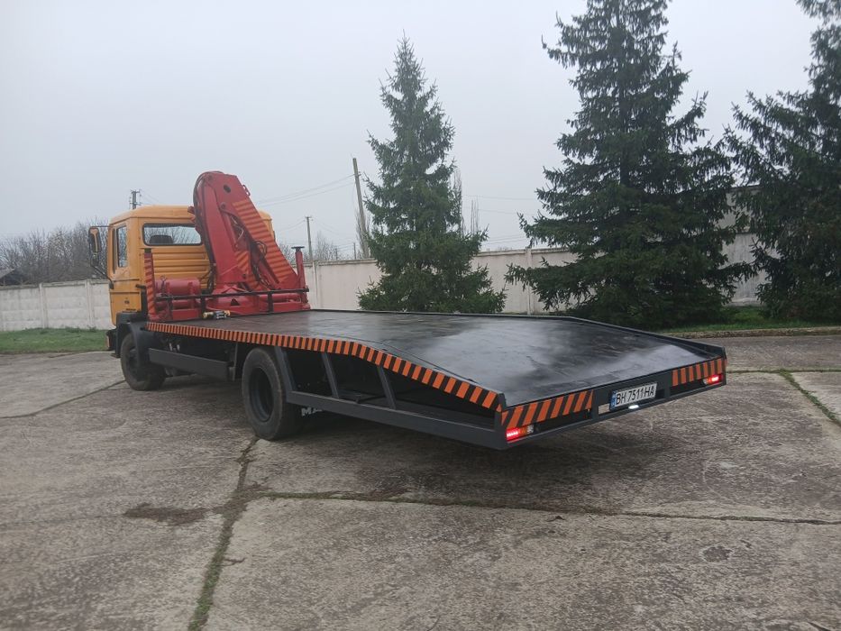 Ман евакуатор манипулятор