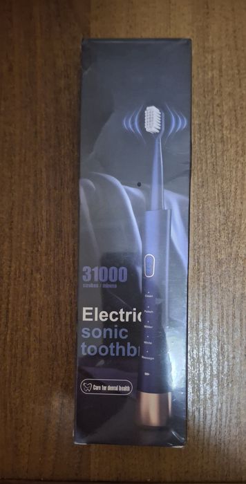 Електрична зубна щітка