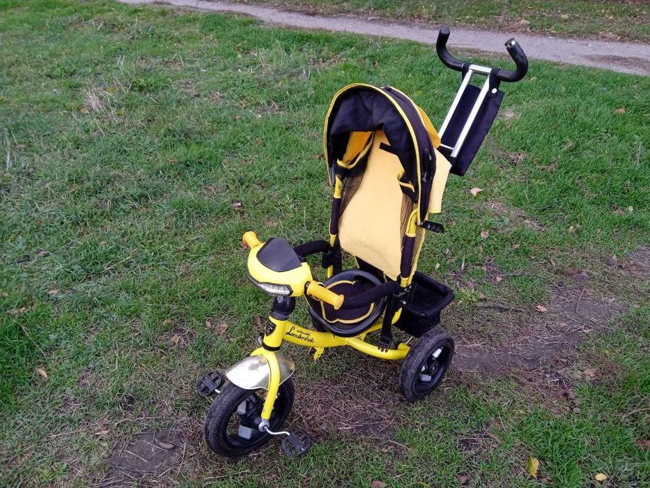 Продам детский велосипед с ручкой