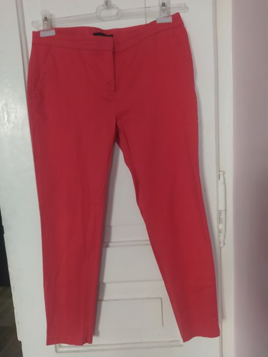 Spodnie damskie z kieszeniami r 38 koralowe