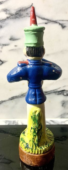Estatueta de músico em terracota