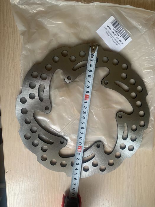 Продам тормозний диск та колодки для GEON  GRAND TOUR 400 новые