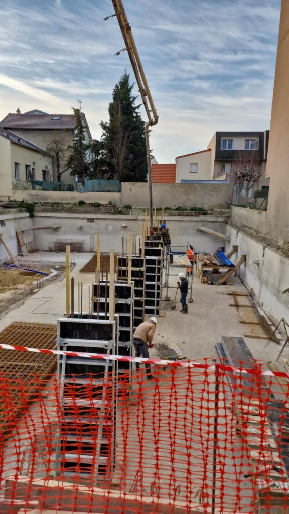Exécutants trabalhos de construcao