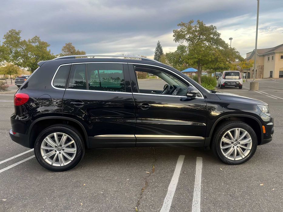 Volkswagen Tiguan      2014