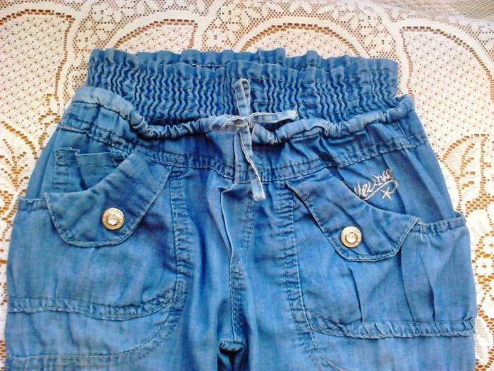 Niebieskie spodnie jeans r. 98