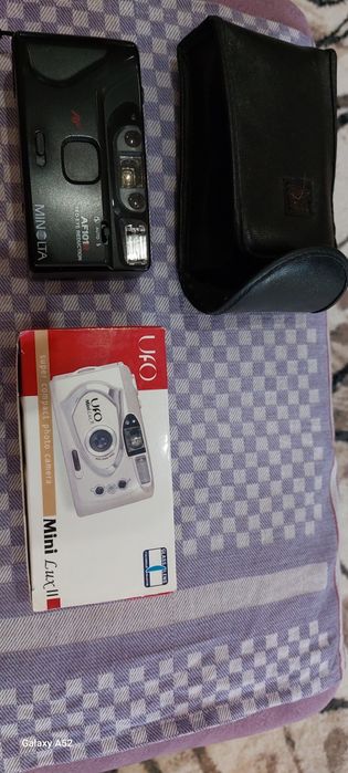 Фотоаппарат плёночный Minolta AF101R и UFO