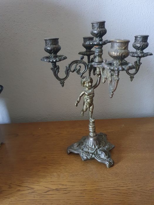 Sprzedam swiecznik ładnie zdobiony wydaje mi się że z brązu