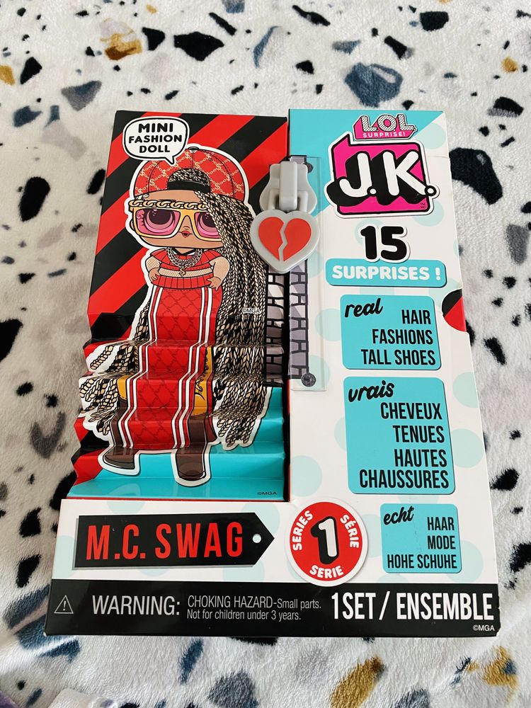 L.O.L. Surprise! JK M.C. Swag Mini Fashion Doll with 15 Surprises