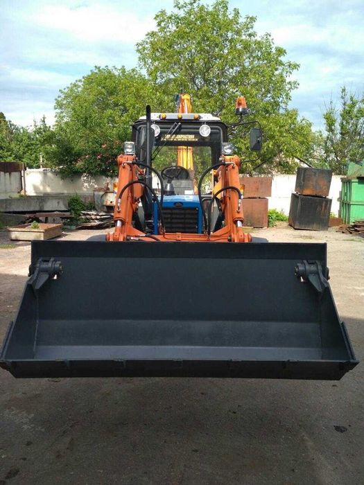 Экскаватор-погрузчик БАМ-2014