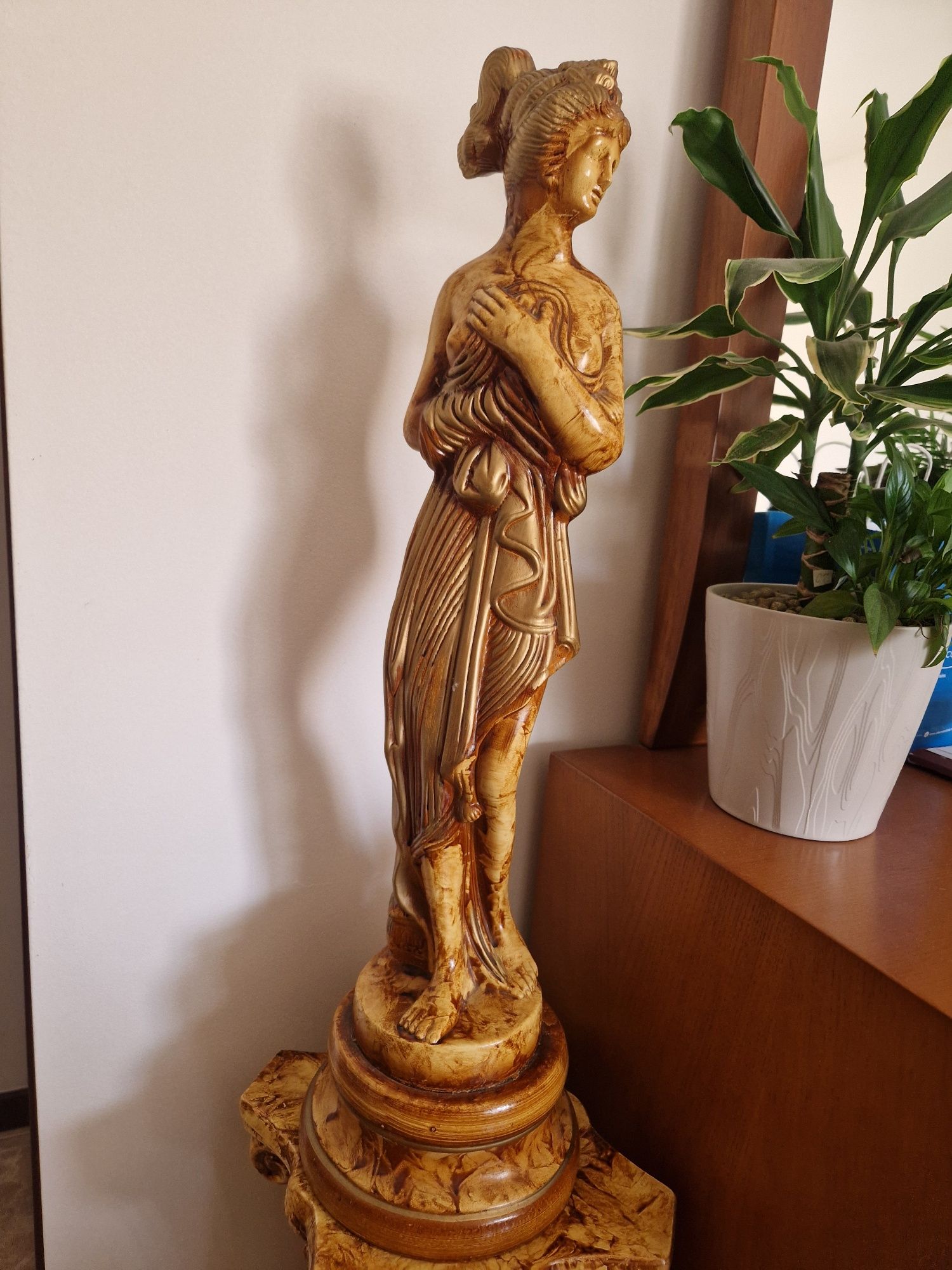 Estátua como nova