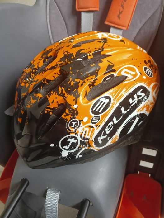 Fotelik rowerowy Kross z kaskiem