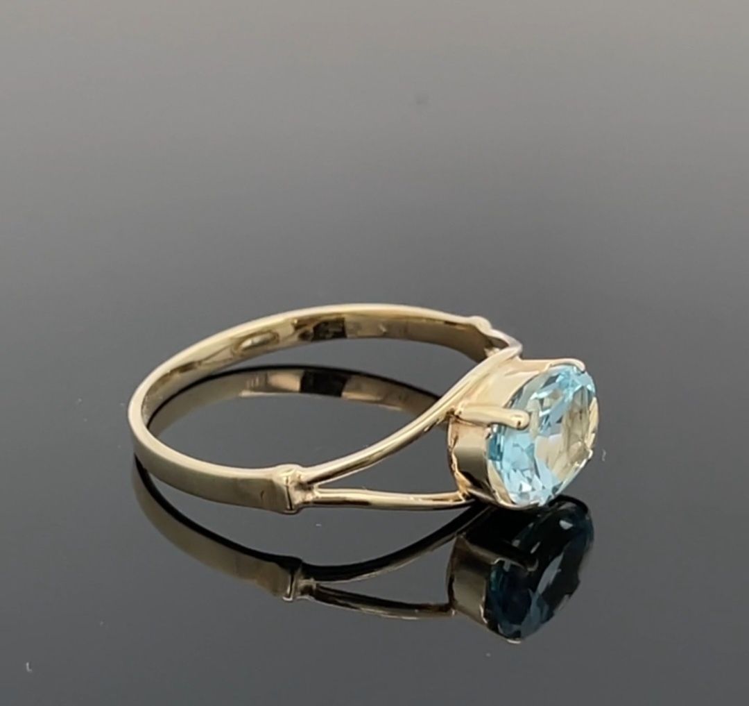 Złoty pierścionek niebieski topaz + certyfikat