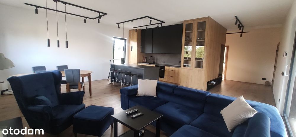 Nowoczesne, przestronne mieszkanie z garażem i tarasem – jak dom