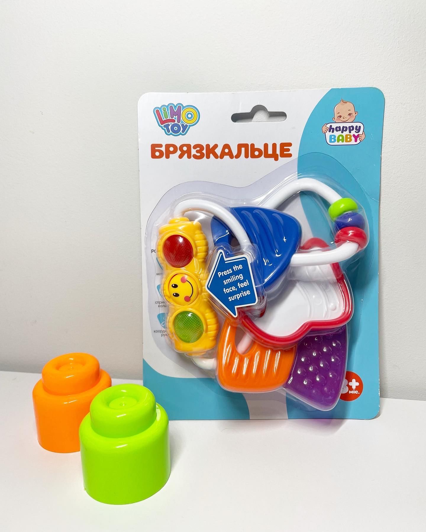 Дитячі іграшки для малюків (брязкальце / пірамідка)