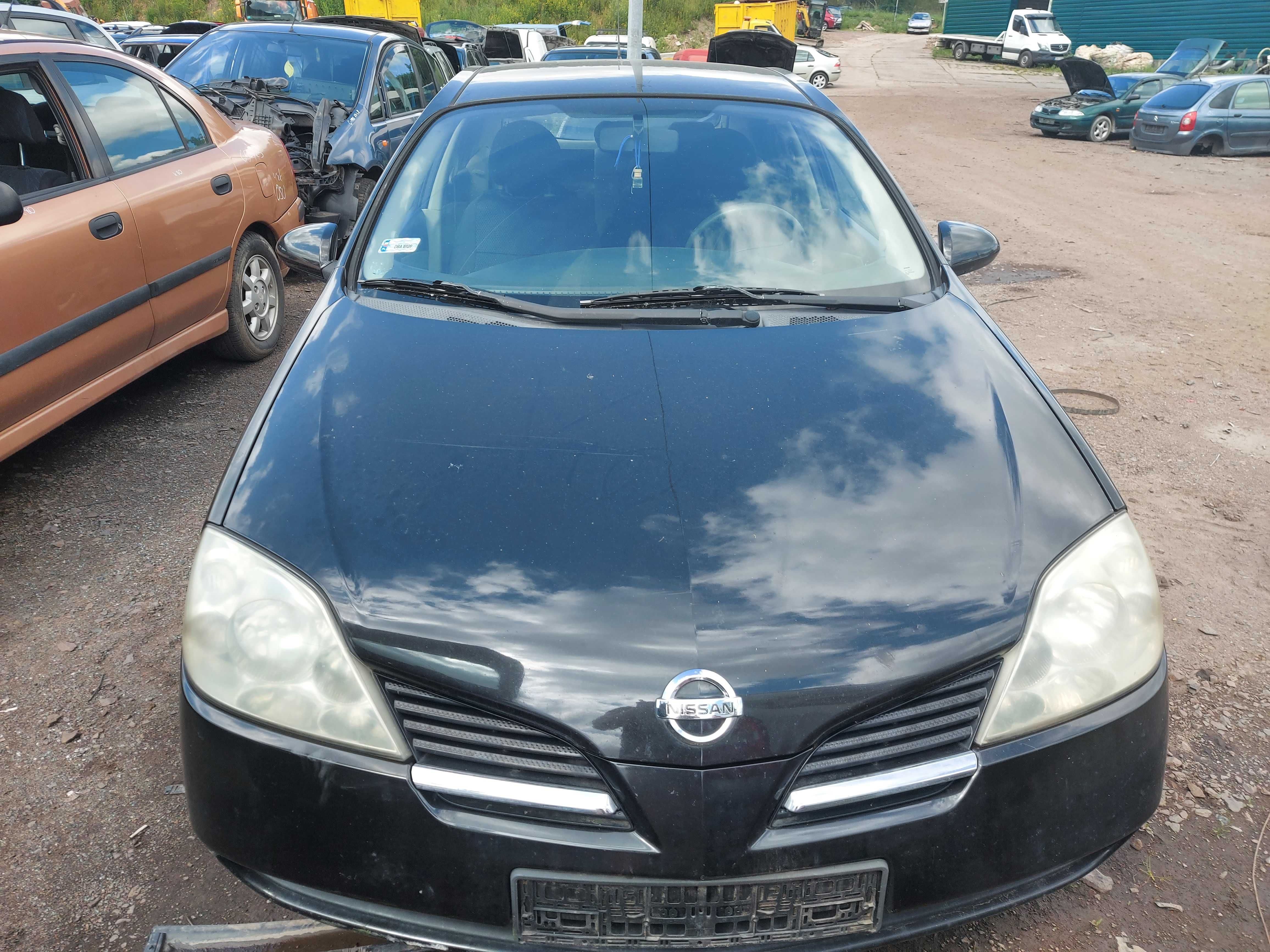 Nissan Primera P12 drzwi przednie lewe czarne FV części/dostawa