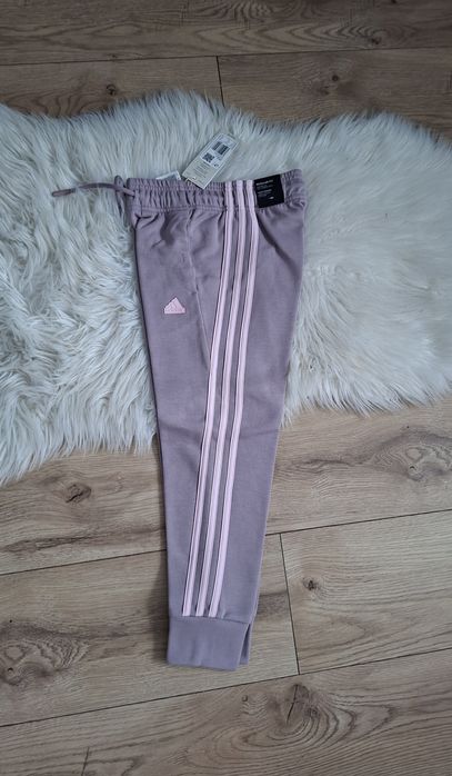 Adidas IS3410 spodnie dresowe dla dziewczynki liliowy róż r.128cm (7-8