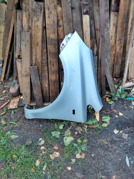 Błotnik przedni lewy Corsa D