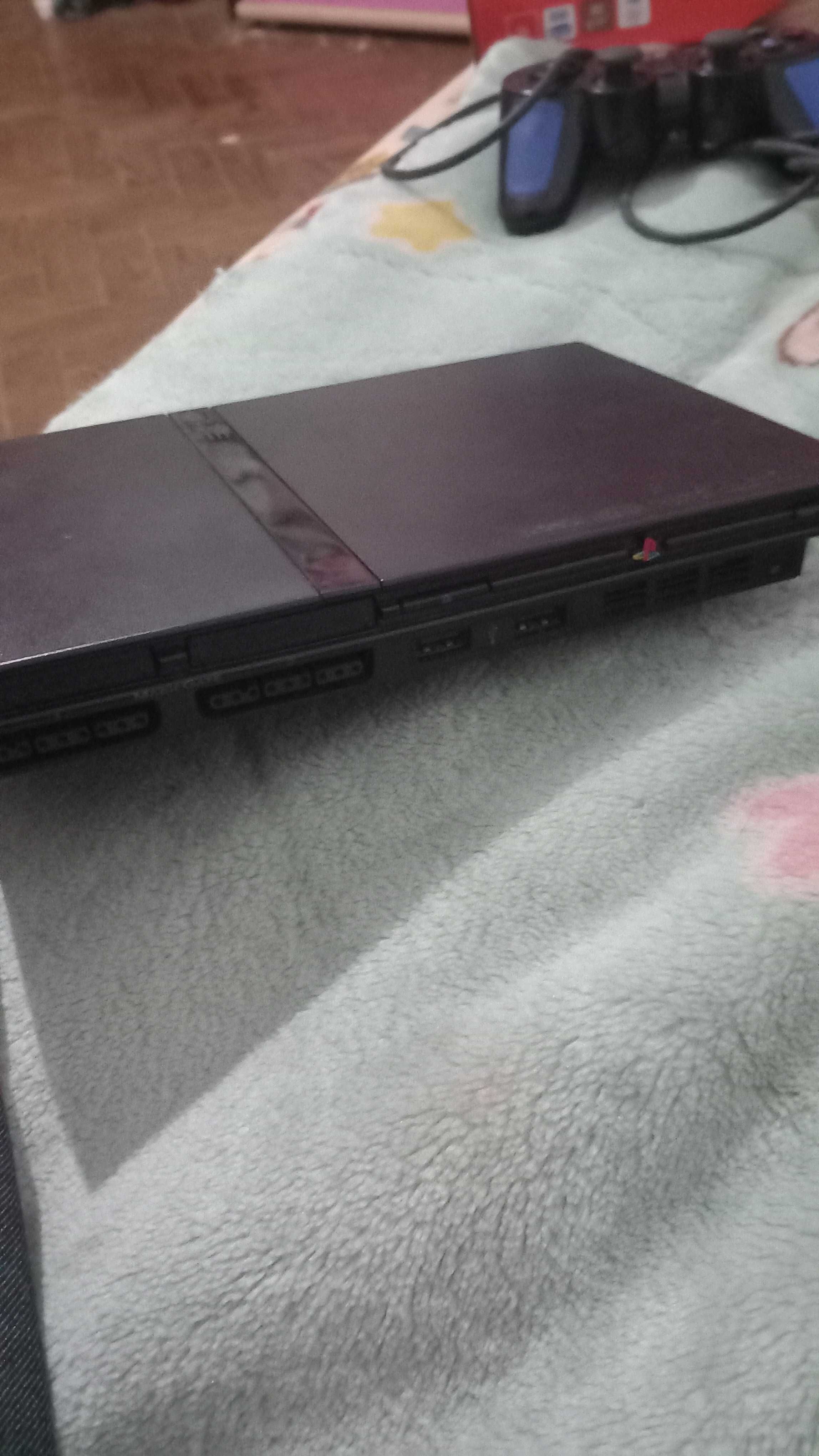 Vendo Ps2 Slim com comando paralelo